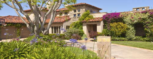 A Spanish-style villa in with California landscaping